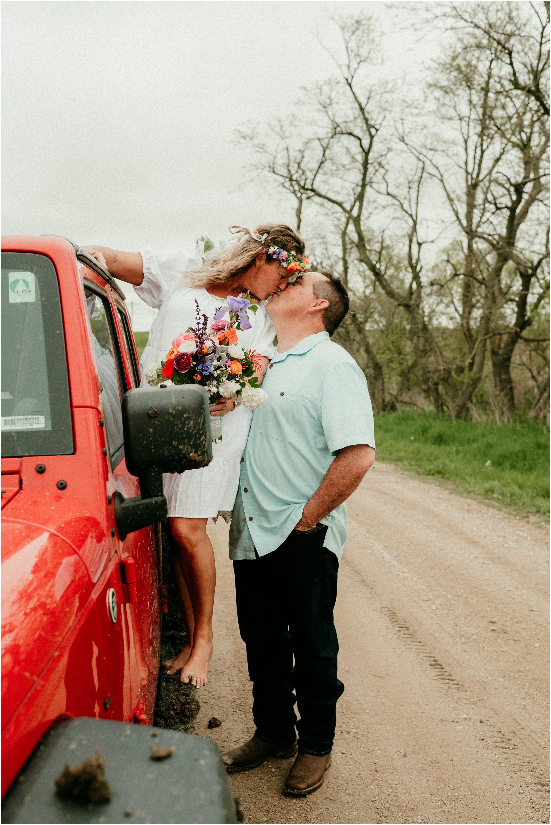 Tree in the middle of the Road Brayton Iowa Wedding Photos Red Jeep Couples Photos